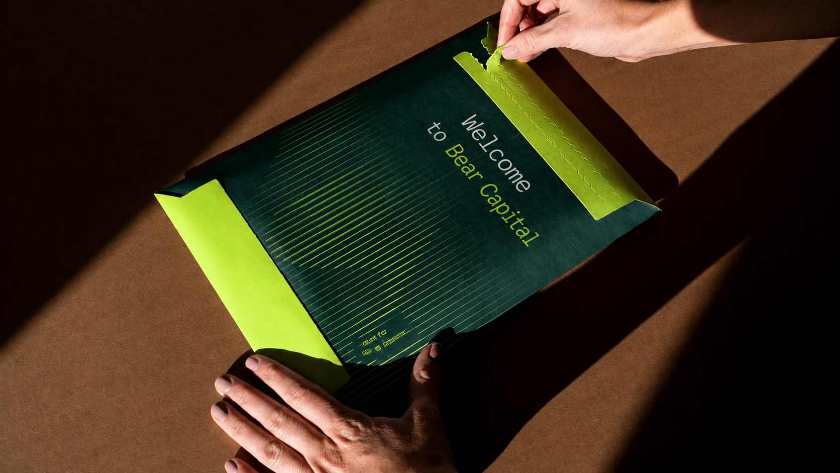 A Bear Capital welcome envelope being opened